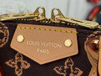 Tan leather interior logo patch reading LOUIS VUITTON PARIS on monogram fabric