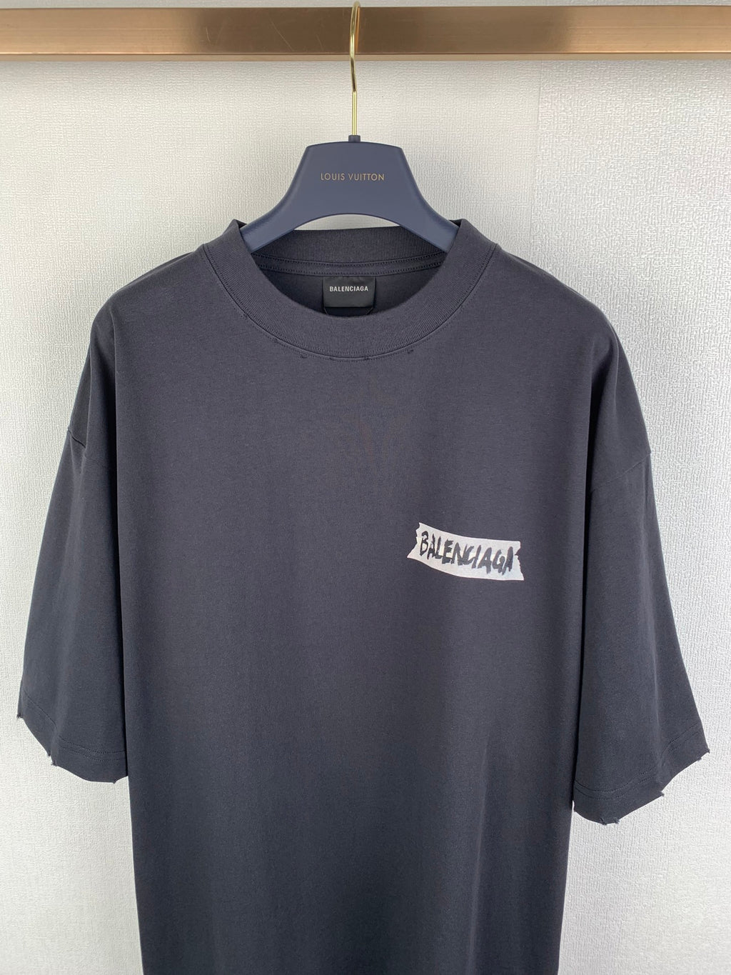 Balenciaga dark crewneck T-shirt with chest graphic logo