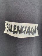 Balenciaga chest logo graphic on dark T-shirt