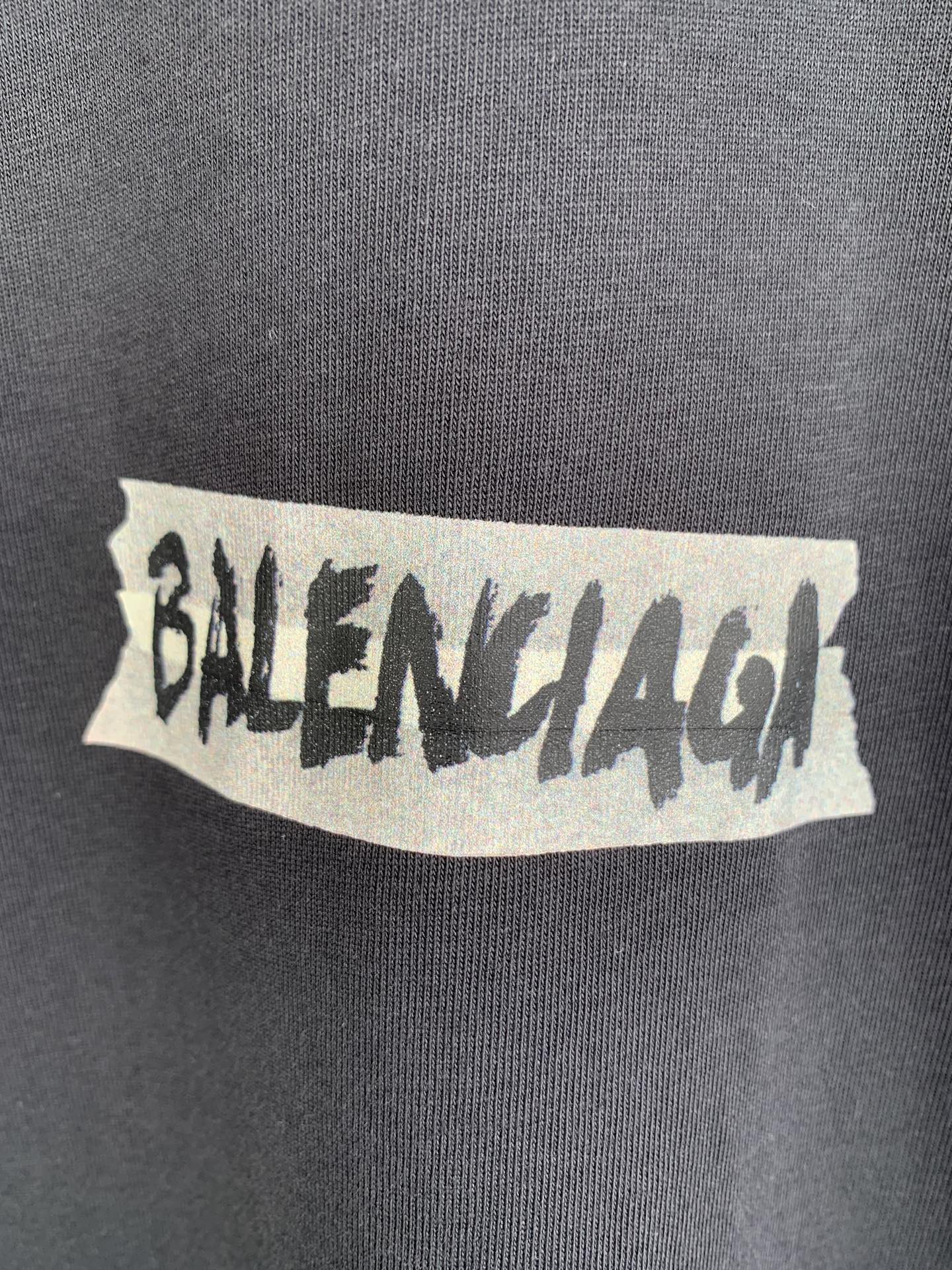 Balenciaga chest logo graphic on dark T-shirt