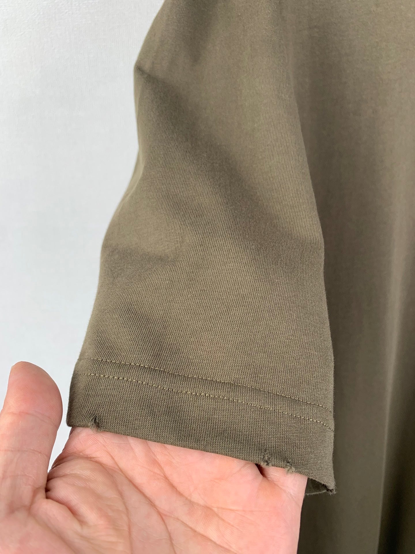 Balenciaga T-shirt sleeve hem in olive with double-stitched cuff edge