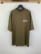 Balenciaga T-shirt in olive with small chest logo patch and short sleeves