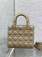 Dior quilted mini handbag in beige with top handle and long crossbody strap