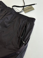 Balenciaga black pants with zip pocket detail and elastic waistband