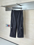 Balenciaga black drawstring wide-leg pants with elastic waistband and logo patch