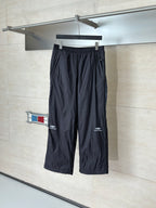 Balenciaga black drawstring wide-leg pants with elastic waistband and logo patch