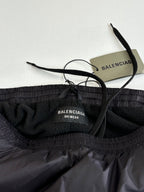 Balenciaga ski wear pants with elastic waistband, inner label, and black drawstrings