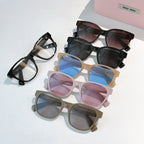 MiuMiu glasses set with multiple frame colors and tinted lenses, group shot