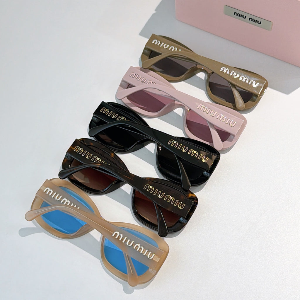 MiuMiu sunglasses assortment with mixed frames and tinted lenses, shown in a group.