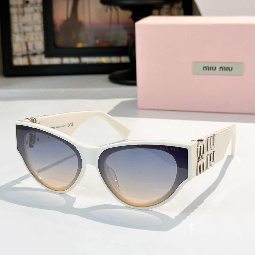 MiuMiu cat-eye sunglasses with white frames and cool blue tinted lenses