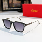 Sunglasses with black frame and gray-lavender tinted lenses, gold-tone metal details.