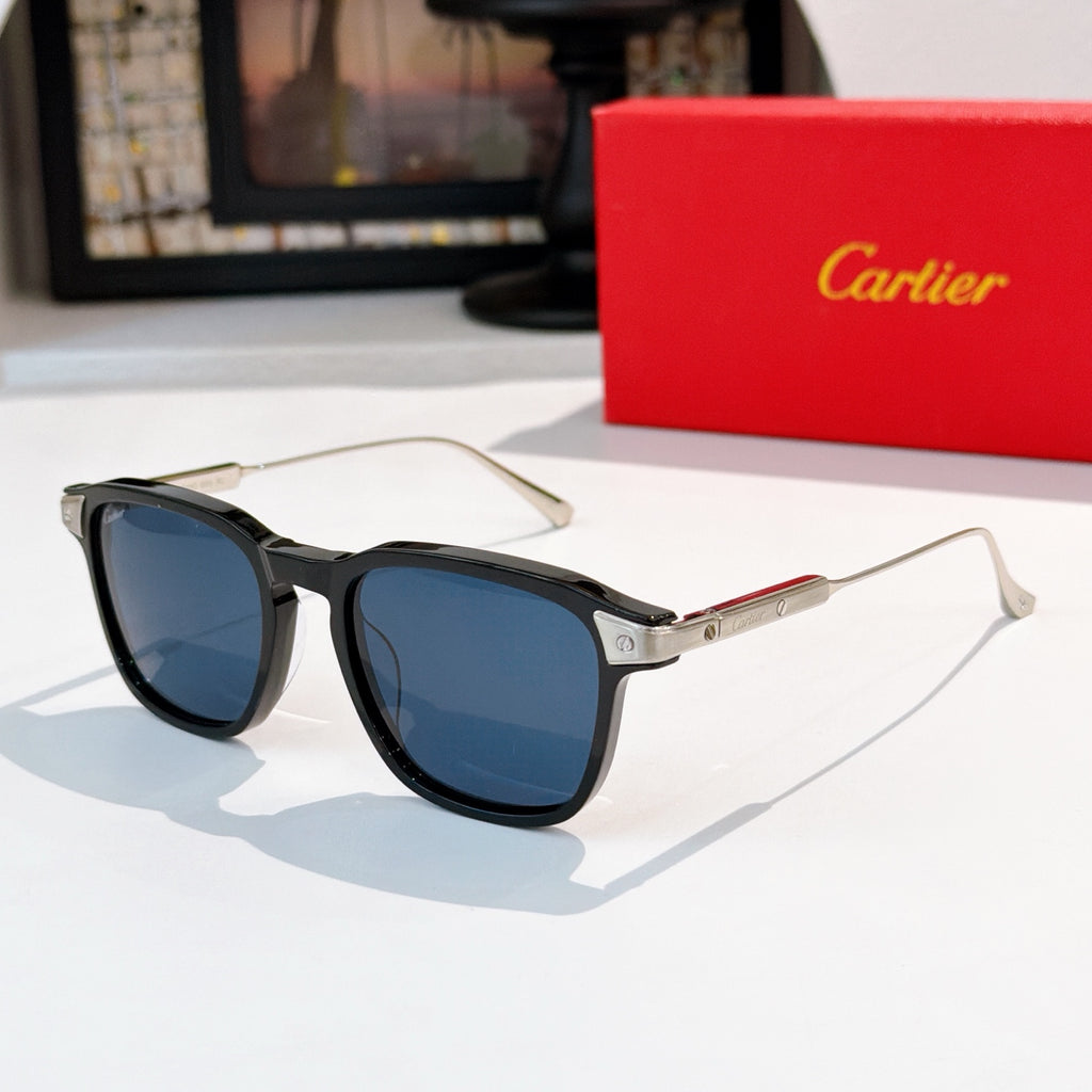 Sunglasses with gray frame and blue-tinted lenses, metal temples with subtle gold detail.