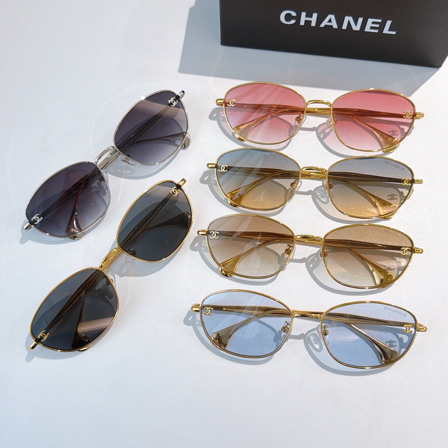 Sunglasses set with gold frames and mixed tinted lenses