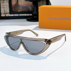 Louis Vuitton sunglasses with taupe frame and gray-blue tinted lenses