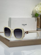 Celine cream square sunglasses with dark tinted lenses and gold-toned accents