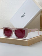 Celine sunglasses with light pink frame and red tinted lenses
