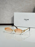 Metal-framed sunglasses with amber gradient lenses and gold-tone temples