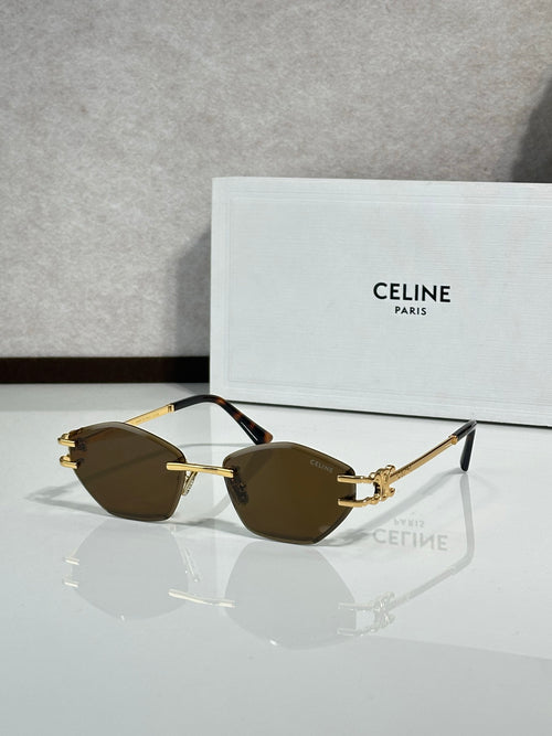 Metal-framed sunglasses with dark brown lenses and gold-tone temple arms