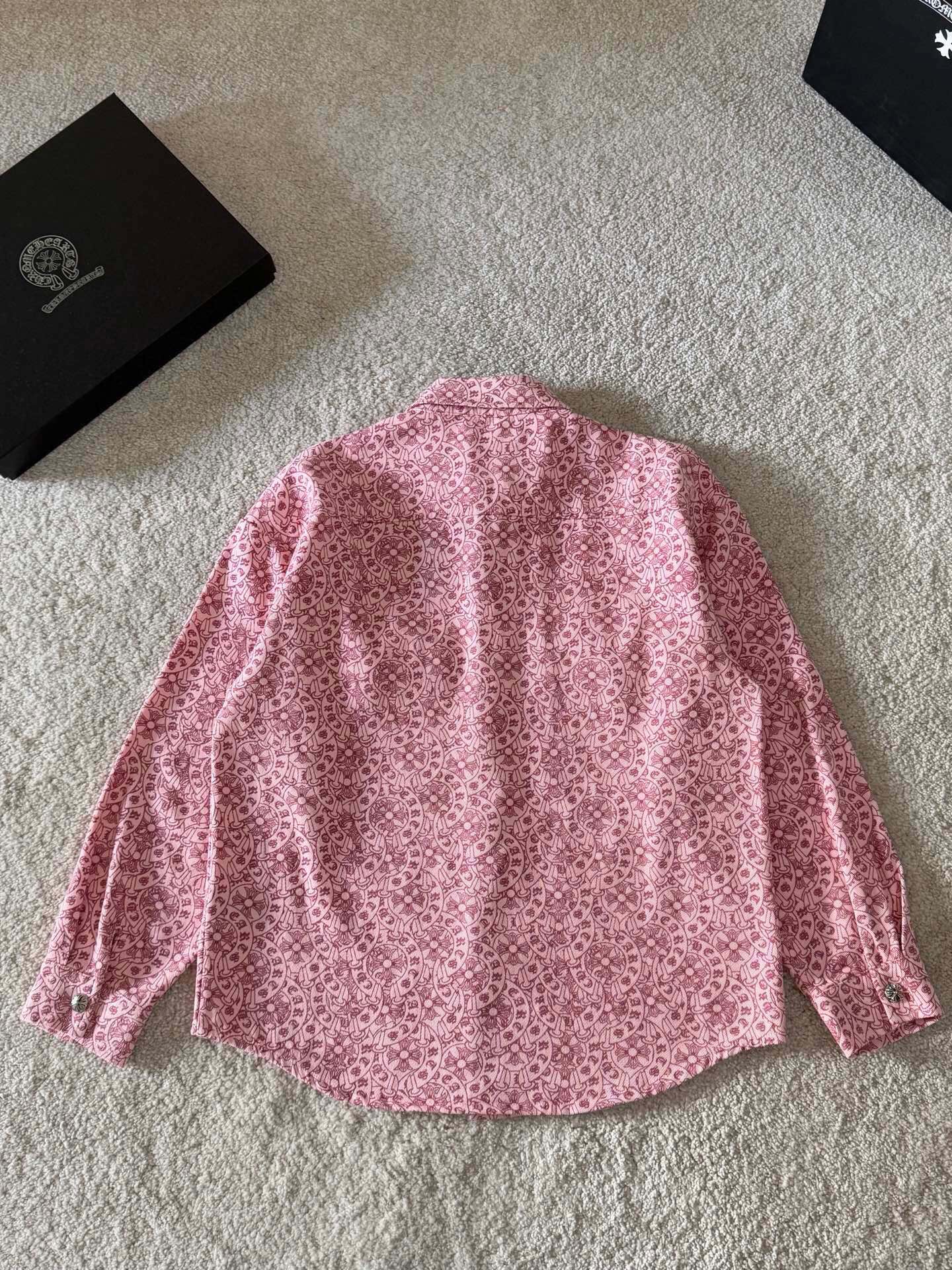 Pink long-sleeve button-up shirt with all-over patterned print and button front
