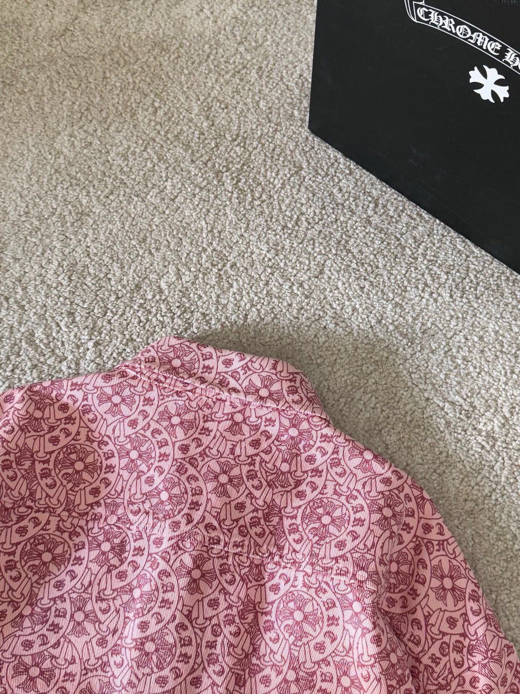 Pink patterned long-sleeve shirt close-up of upper back and collar area