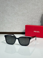 Prada sunglasses with black frame and dark smoke lenses