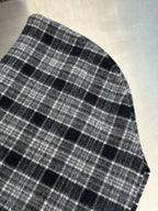 Plaid poncho fabric panel with dark and light grid pattern