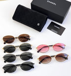 Assorted round sunglasses with multiple colored tinted lenses and black case