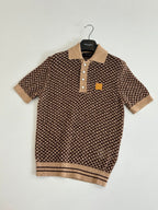 Brown knit polo shirt with tan collar, three-button placket, small logo patch
