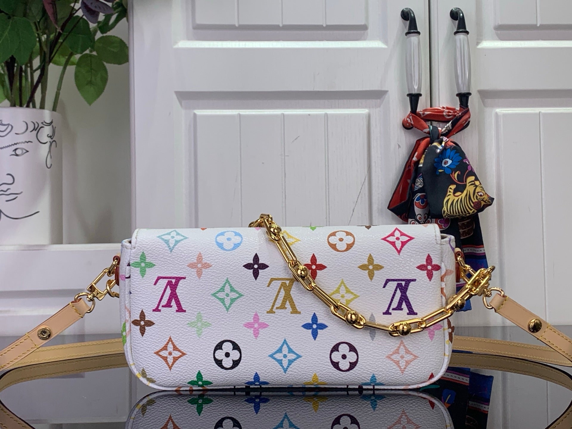 White Louis Vuitton crossbody bag with multicolor monogram front flap and gold chain