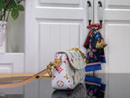 White Louis Vuitton crossbody bag with multicolor monogram, gold chain and adjustable shoulder strap