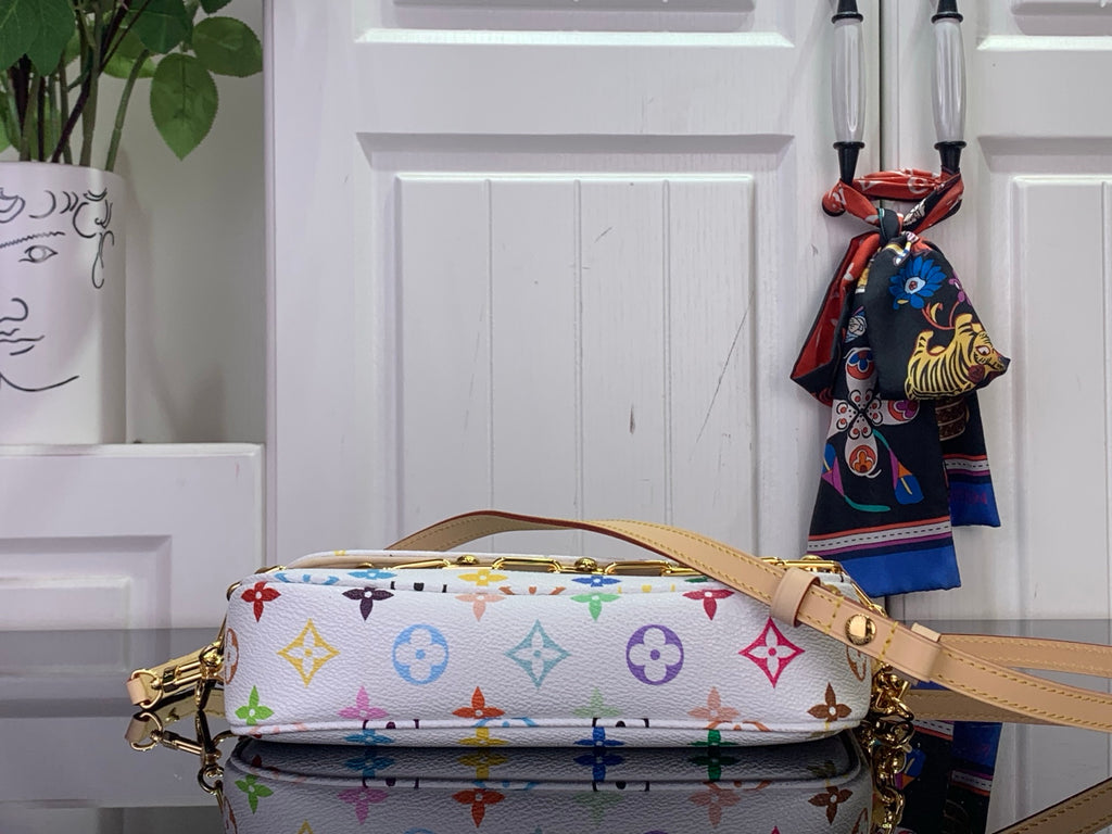 White Louis Vuitton crossbody bag with multicolor monogram, side view with leather strap