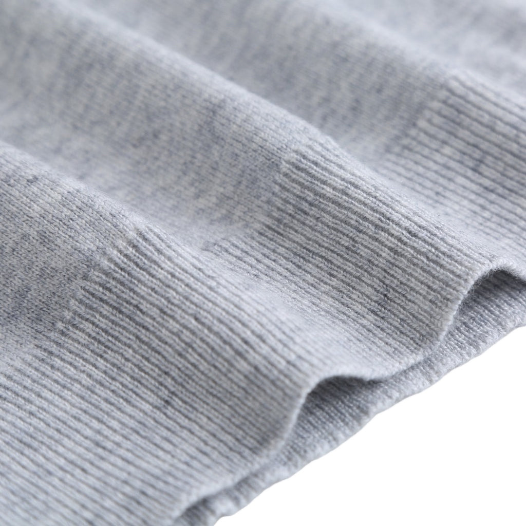 Light gray ribbed sleeve cuff close-up.