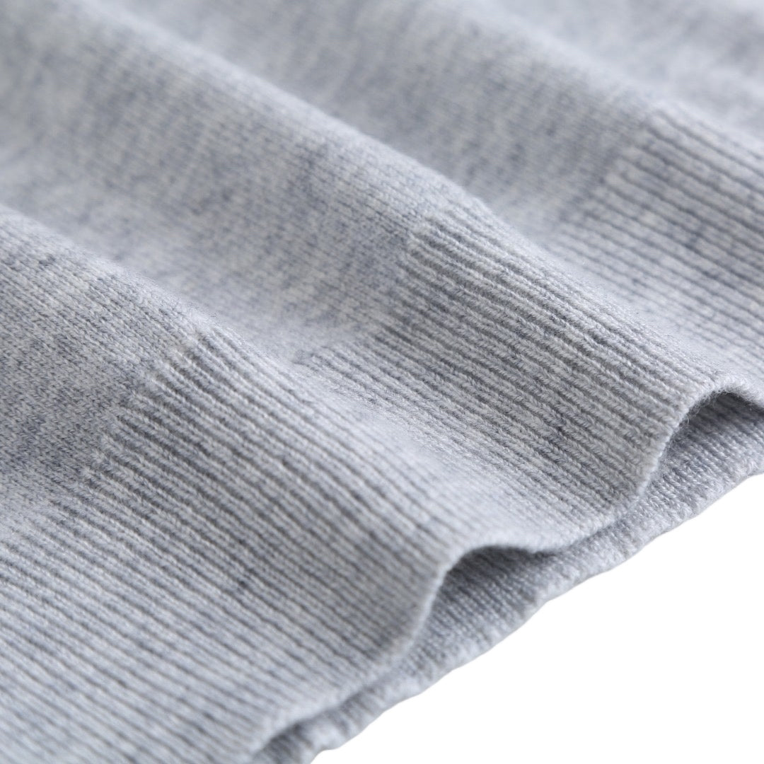 Light gray ribbed sleeve cuff close-up.