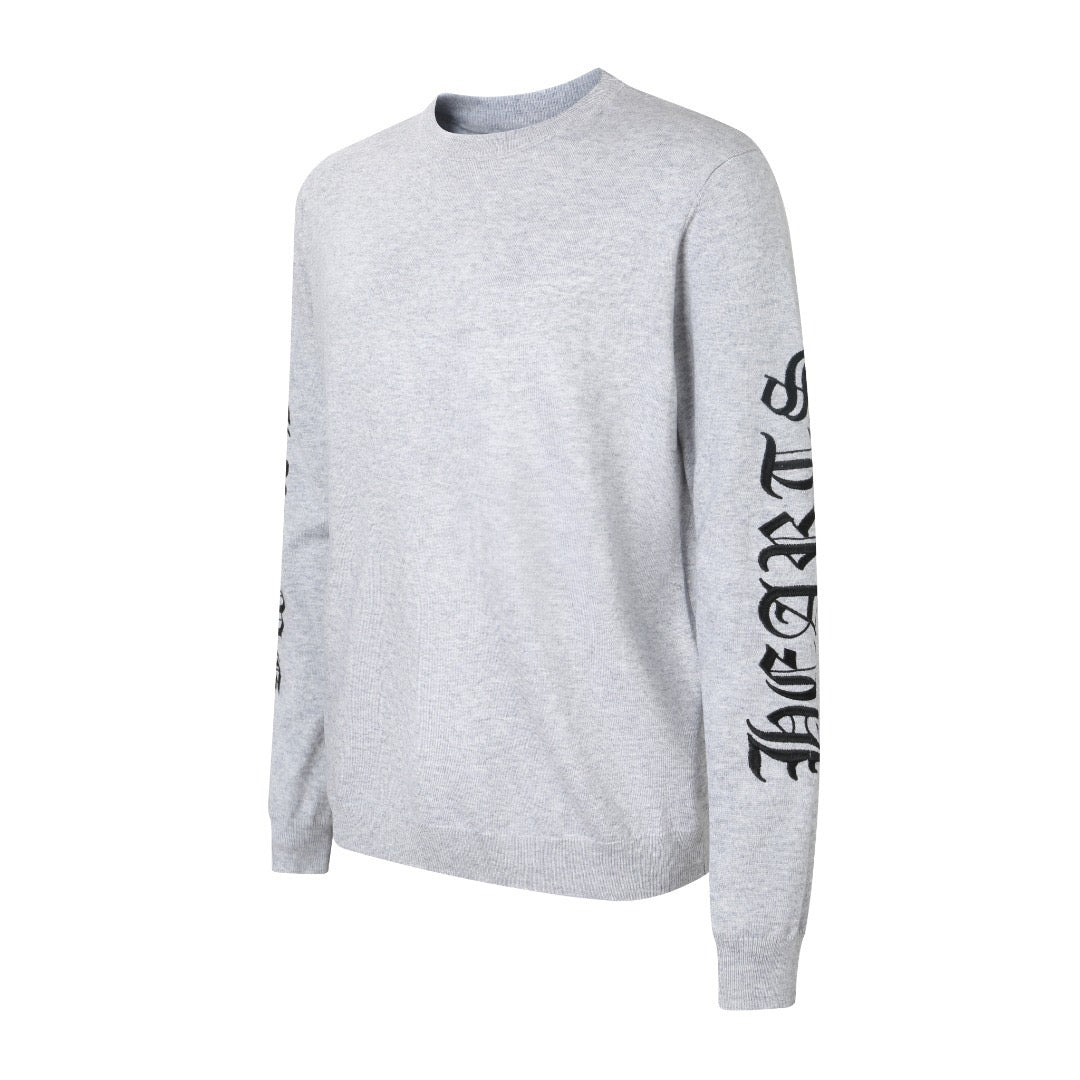 Light gray long-sleeve crewneck sweatshirt with black logo print detail on sleeve.