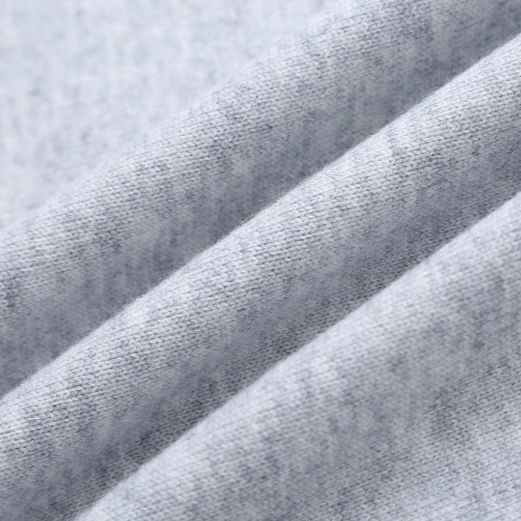 Light gray sweatshirt fabric texture close-up.