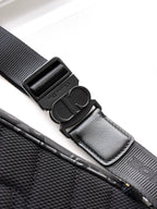 Dior bag strap hardware with adjustable buckle and stitched strap end
