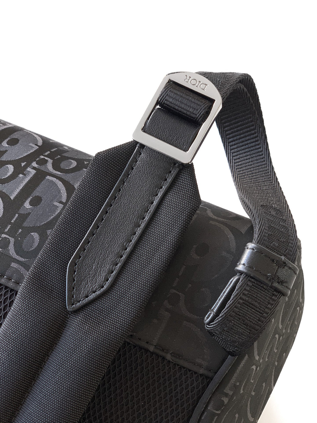 Dior monogram bag strap end with metal adjuster and stitched trim