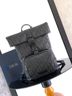 Dior black monogram backpack with flap, front pocket, and adjustable straps