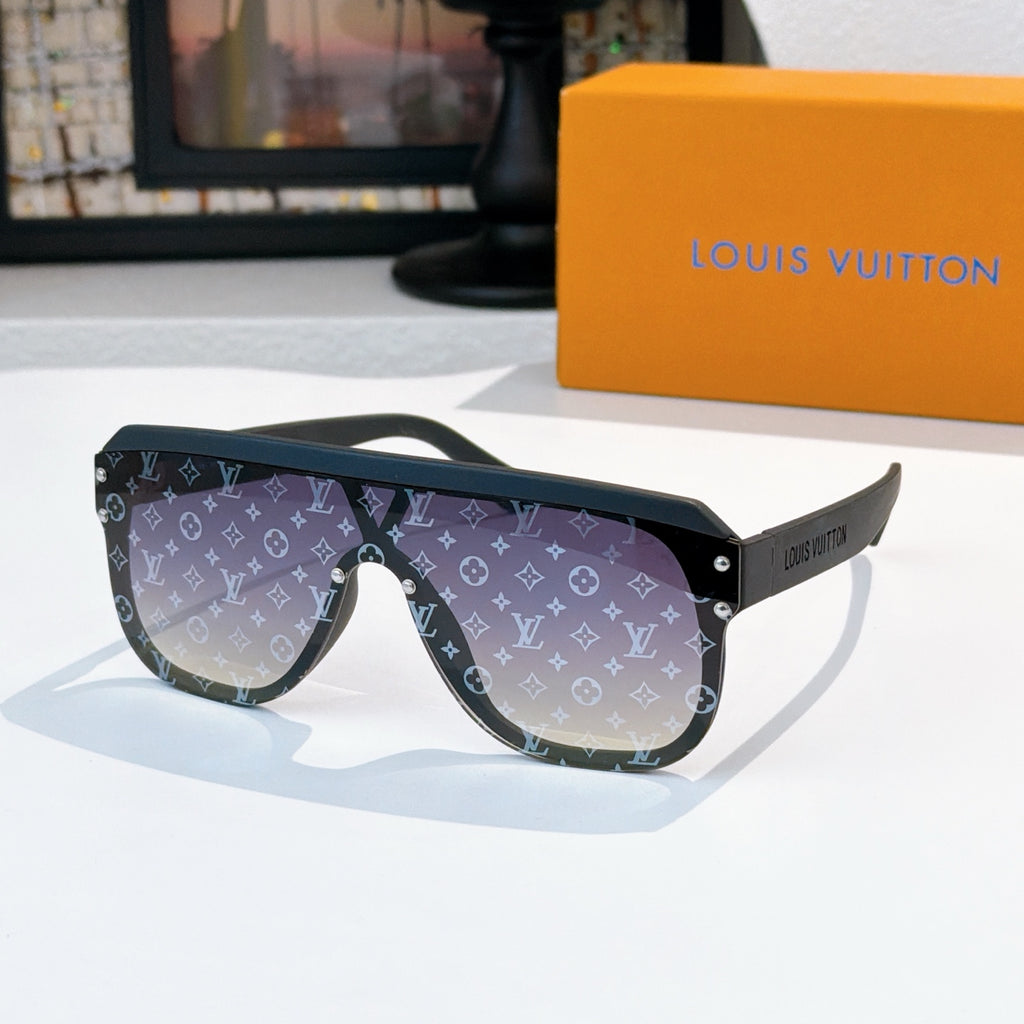 Sunglasses with purple monogram lenses, black frame, and green detail