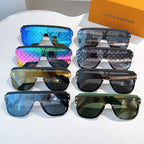 Set of multicolor designer sunglasses on display with black frames