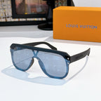 Sunglasses with light blue monogram pattern lenses and dark blue frame