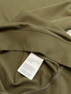 Moncler olive green sweatshirt hem with care label sewn near waistband