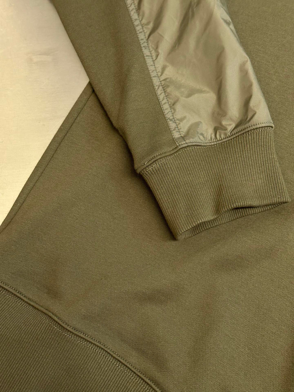 Moncler olive green long-sleeve sweatshirt with ribbed hem cuff and seam