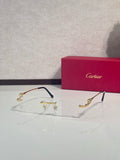 Cartier eyeglasses with clear lenses, dark frame and gold-tone hinges, front view.