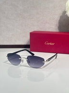 Cartier sunglasses with dark blue frame, gold hinges, and smoky blue lenses