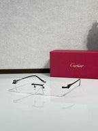 Eyeglasses with clear frame and gold-tone accents, front view with rectangular lens shape