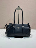 Prada handbag in dark blue leather, structured top handles with side straps
