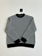 Houndstooth long-sleeve crewneck sweater, black with cream and blue micro-check