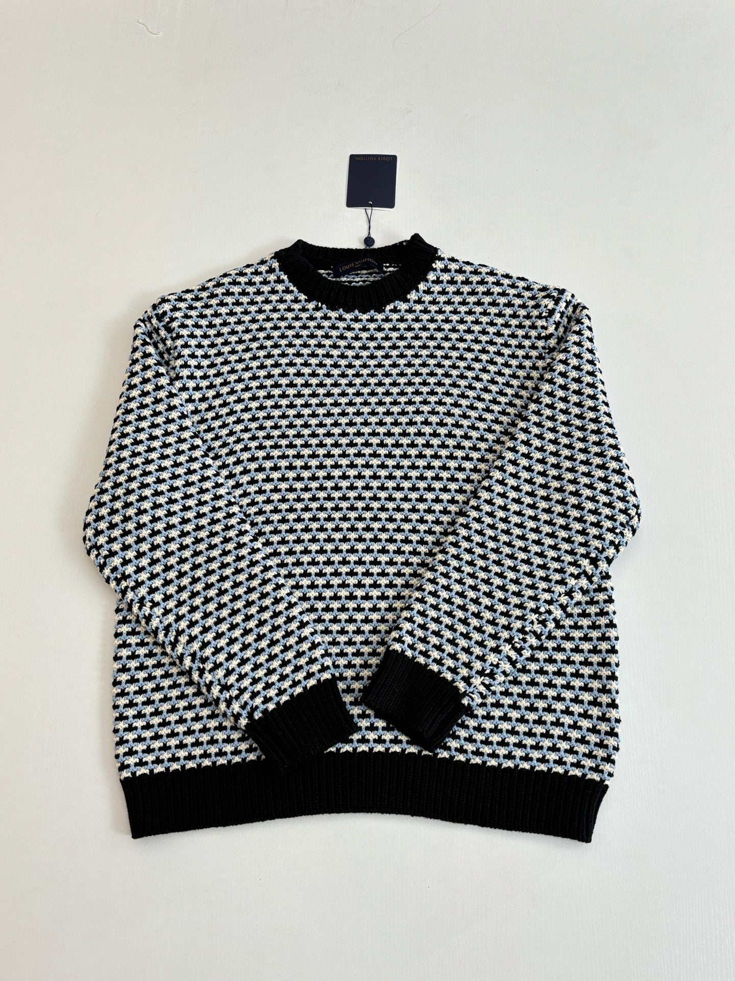 Houndstooth long-sleeve crewneck sweater, black with cream and blue micro-check