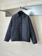 Dark navy long puffer jacket with full-zip and stand collar